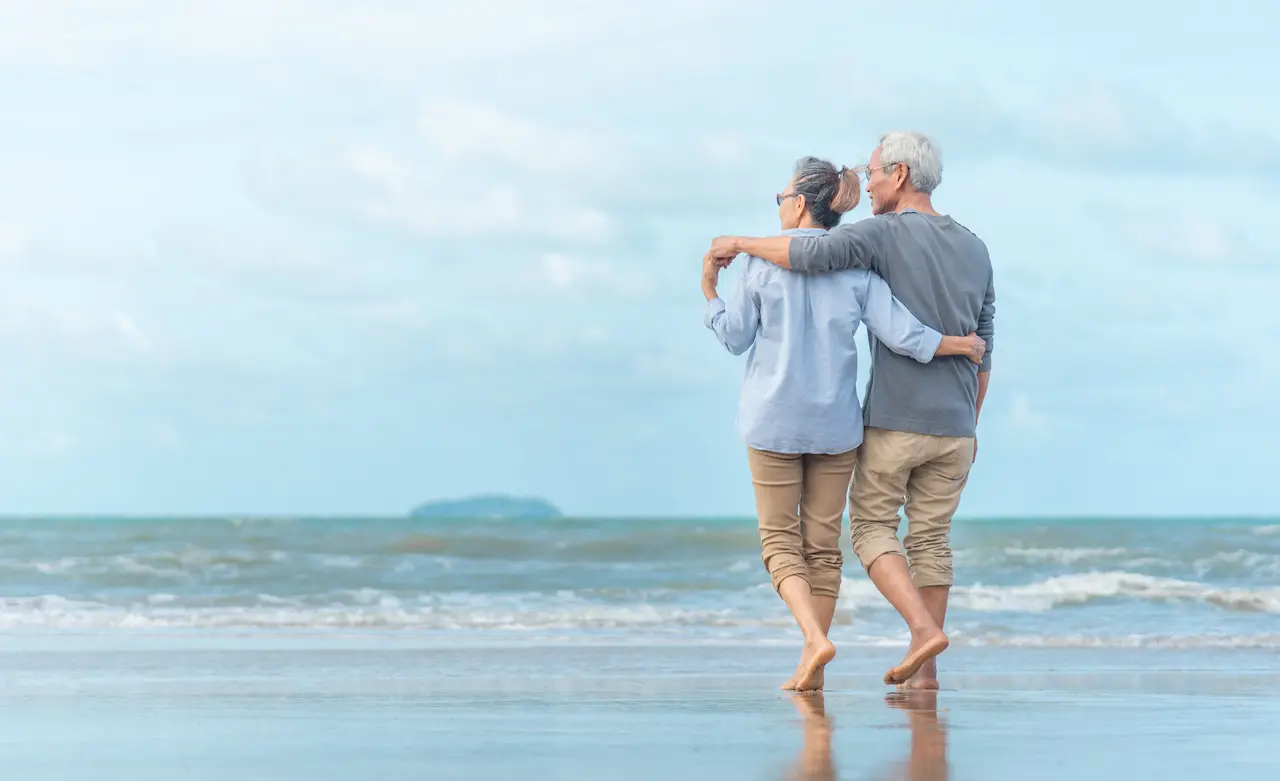 Happy Senior Couple on the Beach 